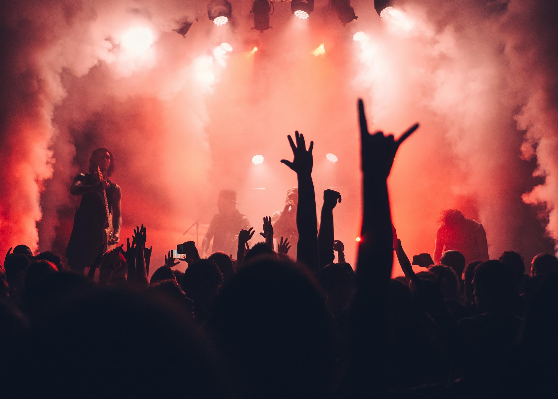 Concert crowd with hands in the air